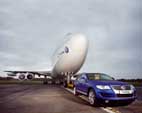 2006 Volkswagen Touareg tows Boeing 747